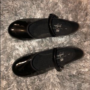 Girls tapping shoes